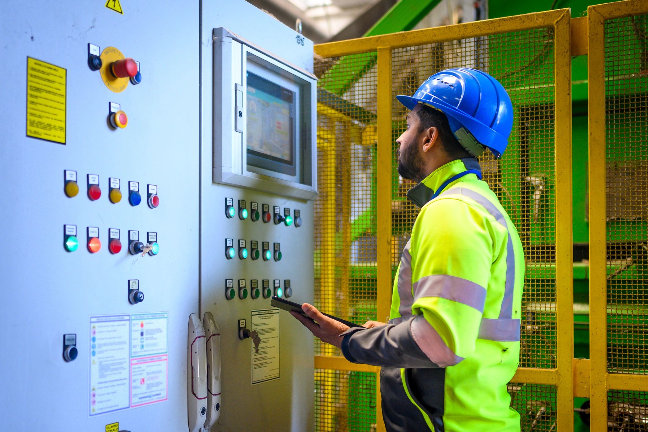 Licensed electrician monitoring electrical systems